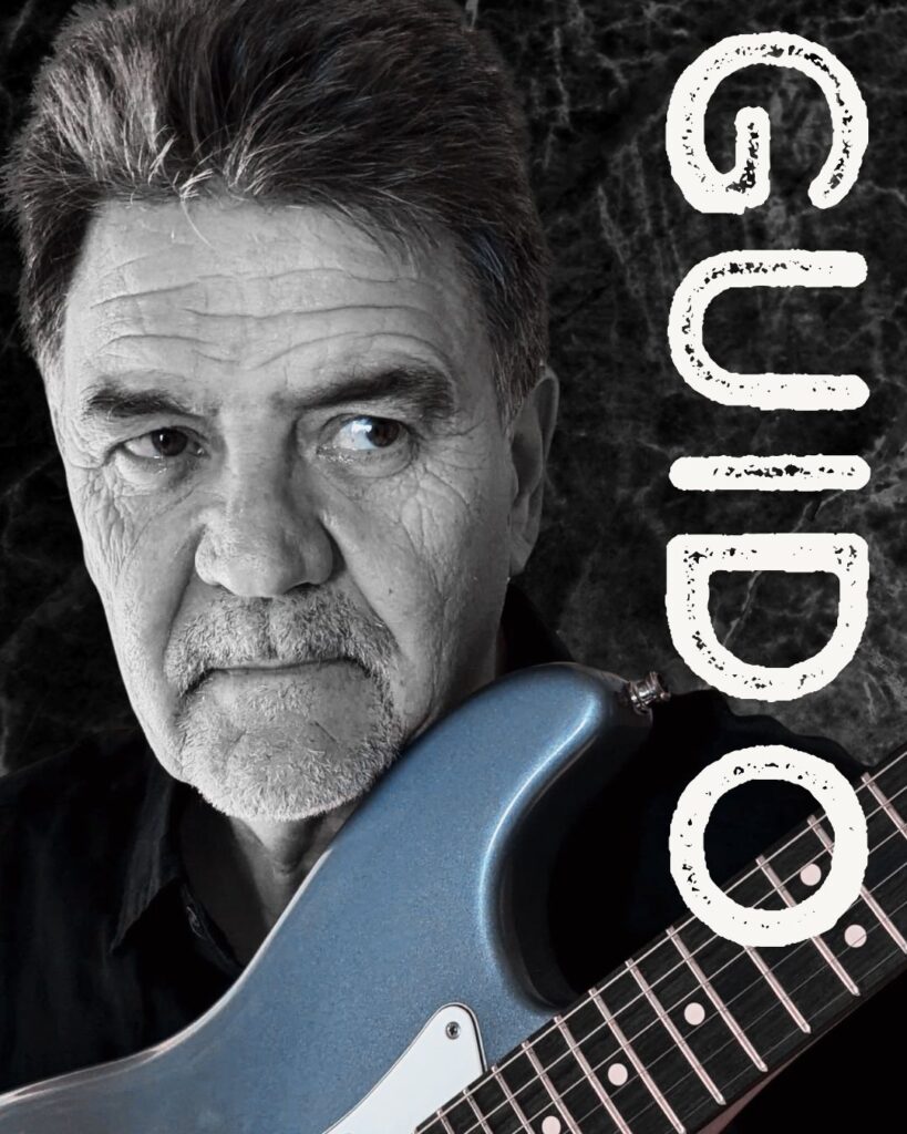 Vocalis/Guitarist - Guido